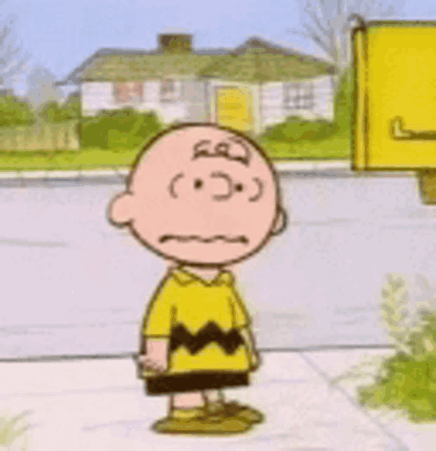 a cartoon character named charlie brown is standing on a sidewalk in front of a house